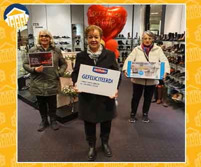 De gelukkige winnaars van de hoofdprijzen van de December Spaaractie